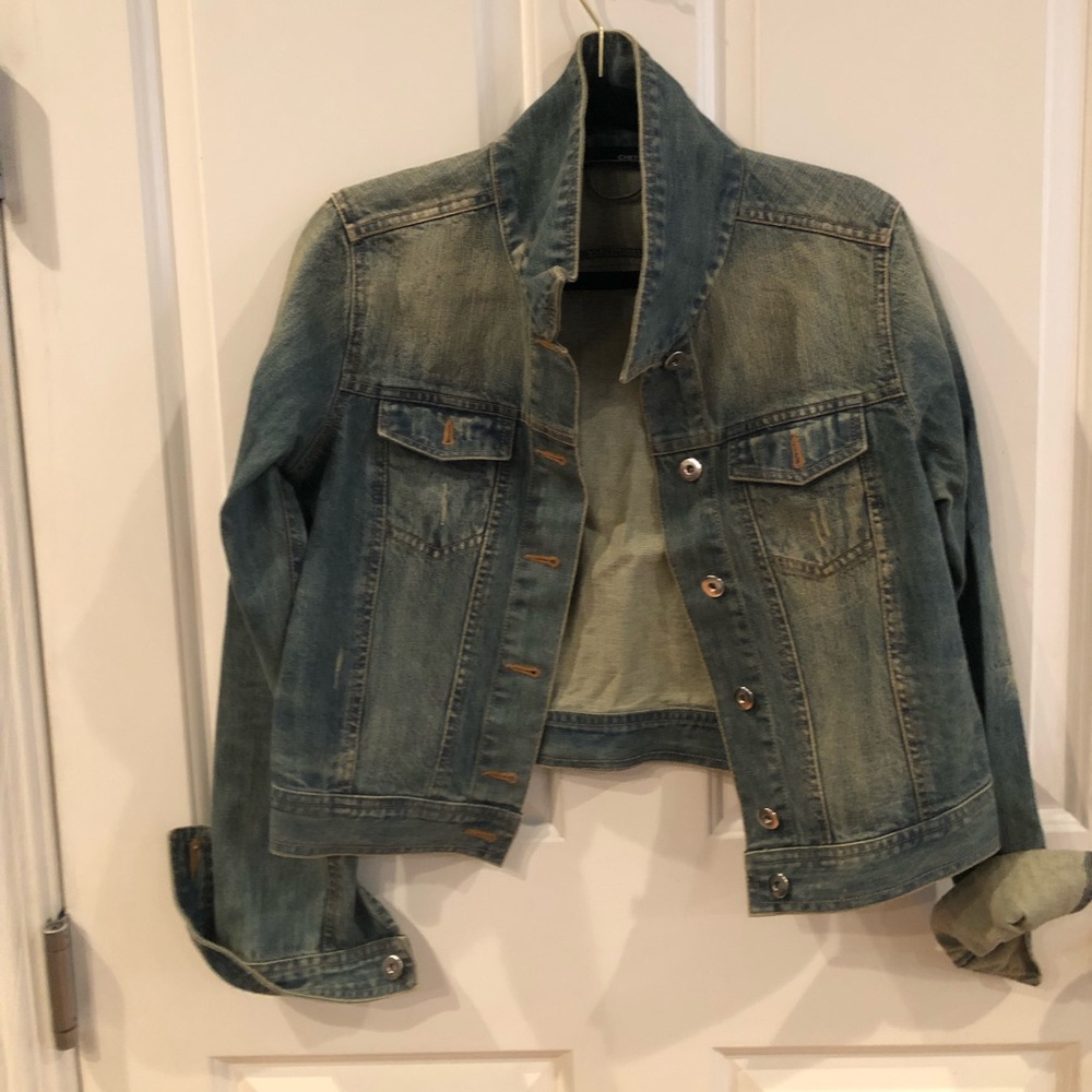 Distressed denim jacket